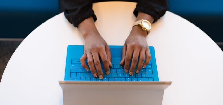 person-typing-on-surface-laptop