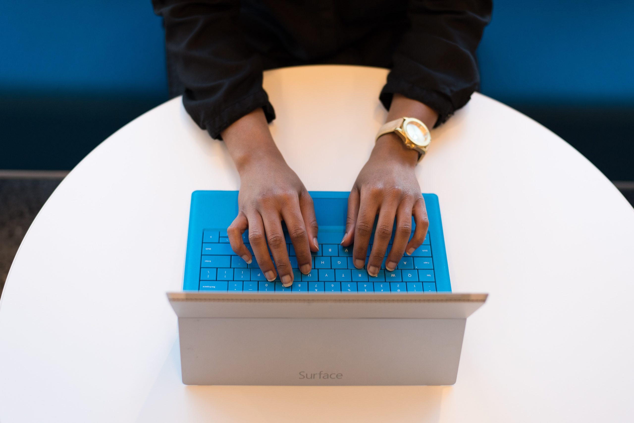 person-typing-on-surface-laptop